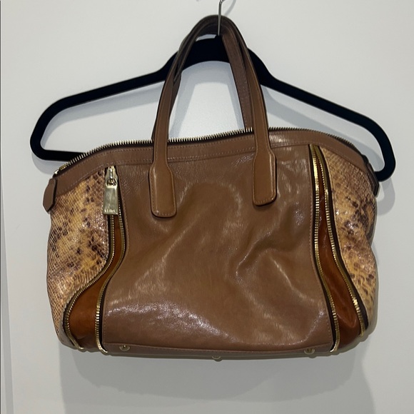 Furla Handbags - Furls snake skin purse